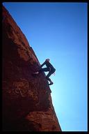 Brian Balkulonis climbing Plastic People (5.10b) at Red Rocks outside Las Vegas, Nevada