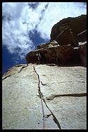 David Benson leading a variation of Guides Wall (5.10b/c). Grand Teton NP, Wyoming