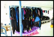 Lots of wetsuits